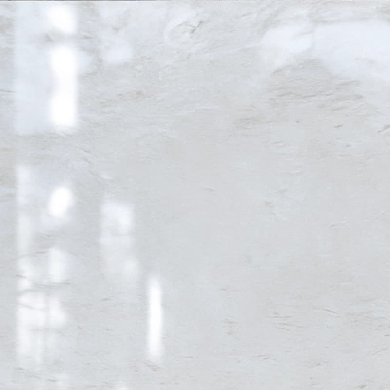 Polished travertine tile reflecting light